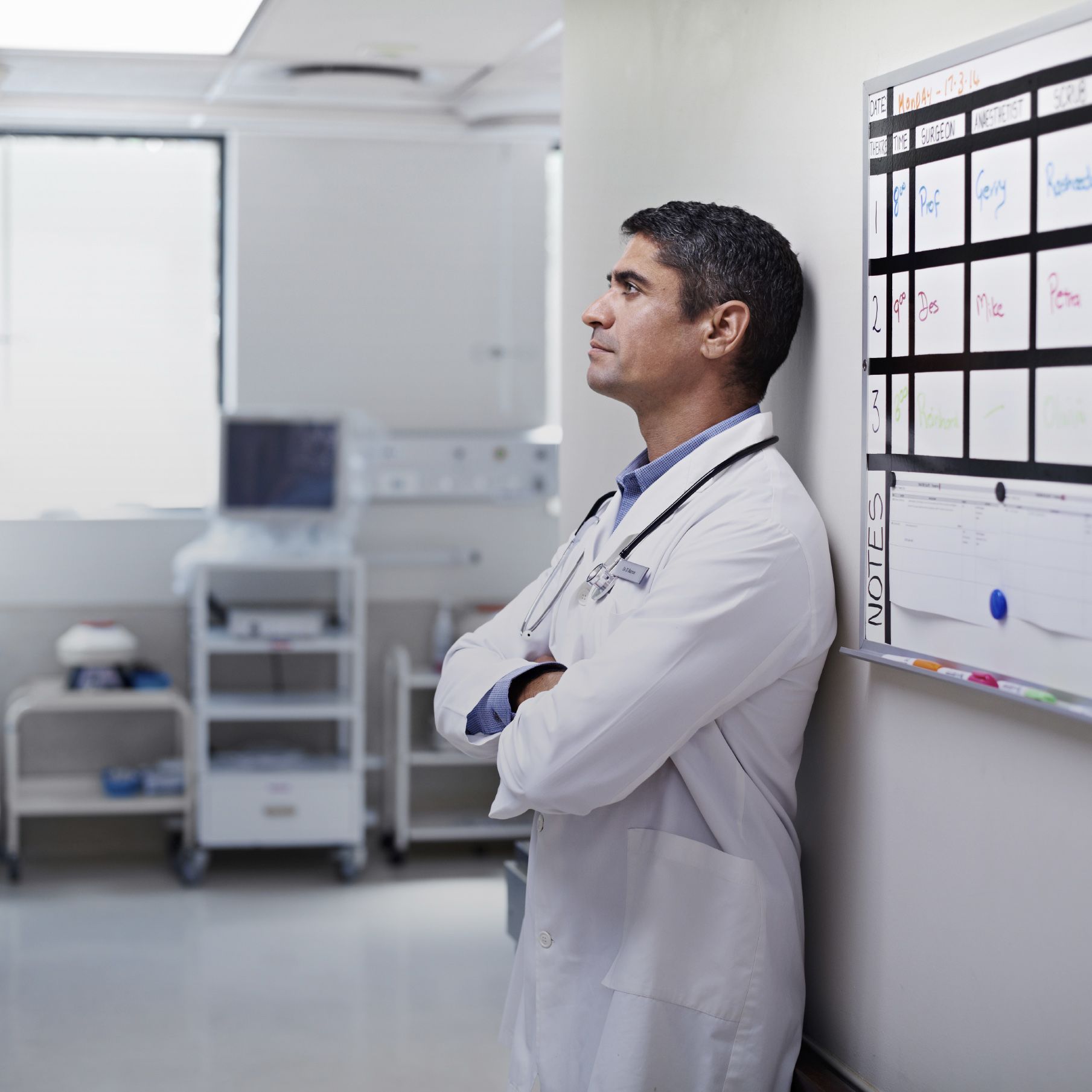 Doctor waiting in hallway