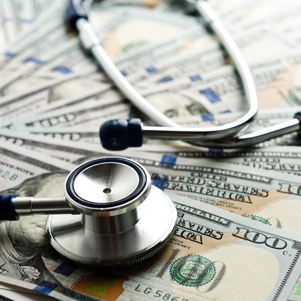 Stethoscope over money